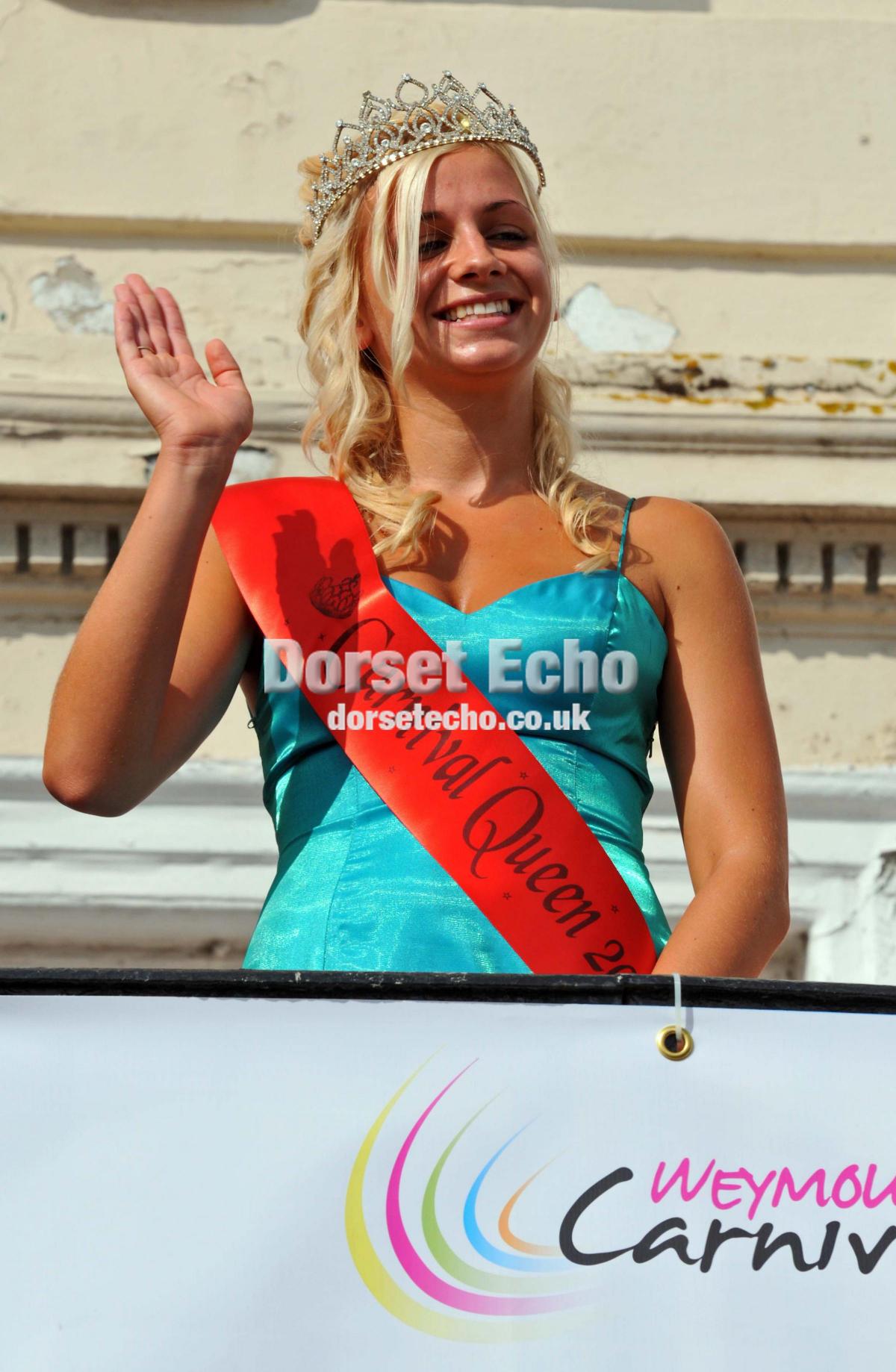 Carnival Queen Gina Hartleywaves to the crowds at her coronation