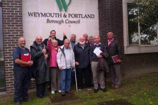DELIGHT: Supporters and members of Weymouth Angling Society welcome the vote