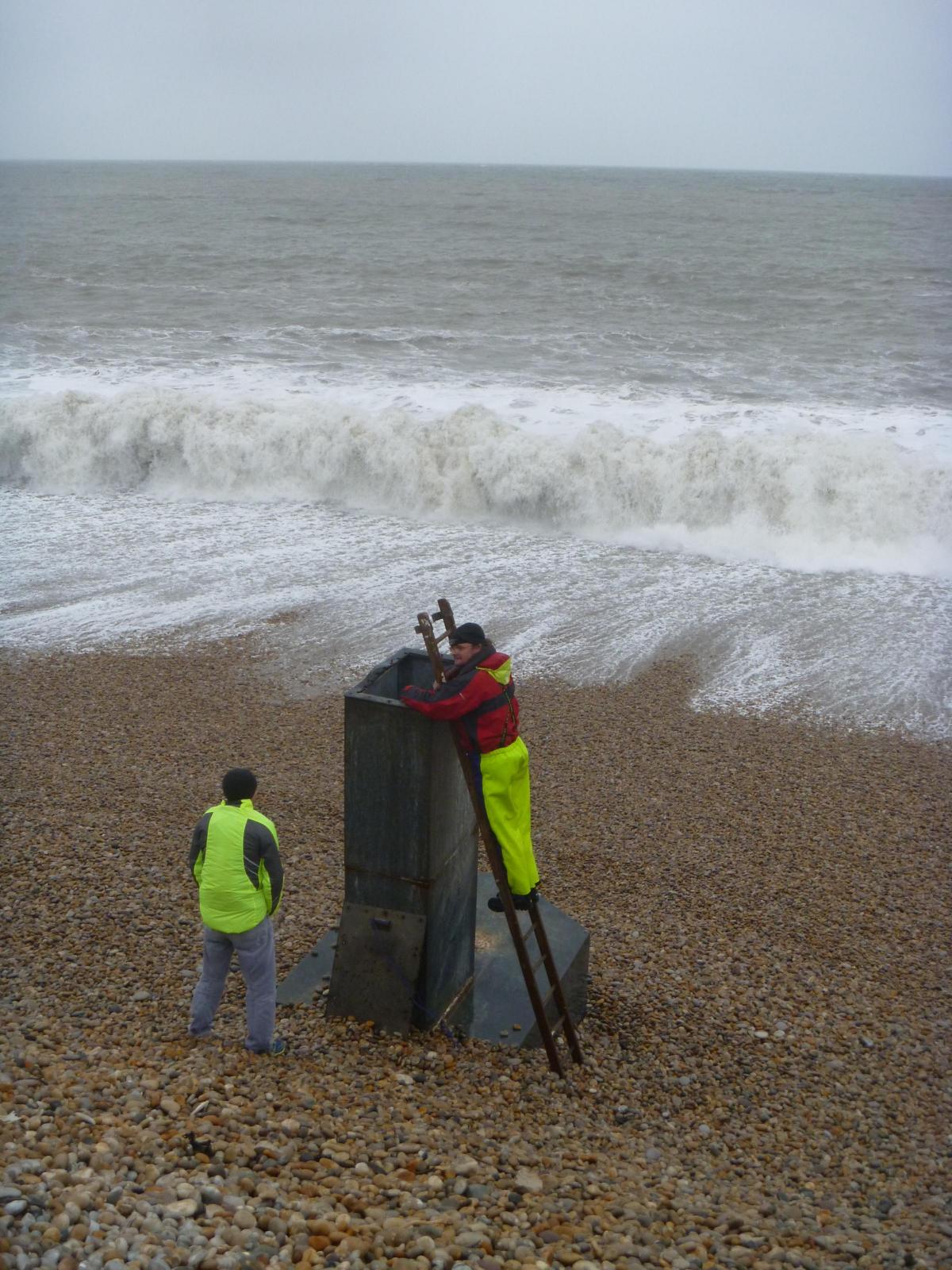 Bridget Betts, of Dorset Coast Forum, sent us this great picture of workers trying to unblock the sea defence drain at Chesil Cove 