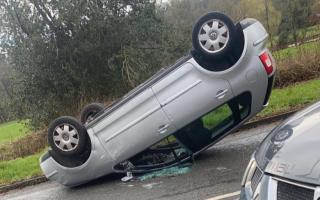 Picture shows car overturned after crash in Frampton
