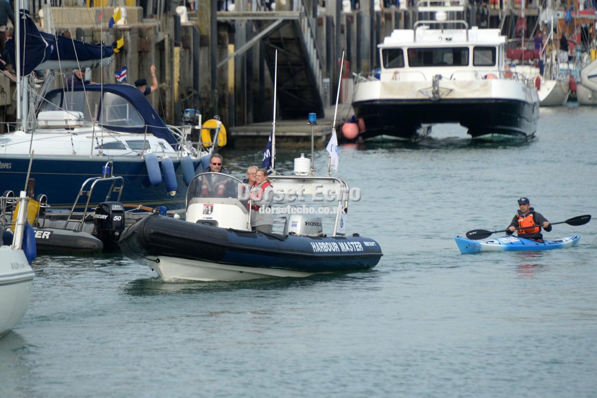 A FLOTILLA of boats says farewell to Portland Coastguard
