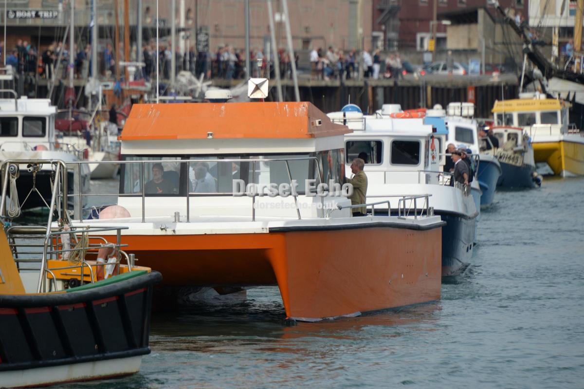 A FLOTILLA of boats says farewell to Portland Coastguard