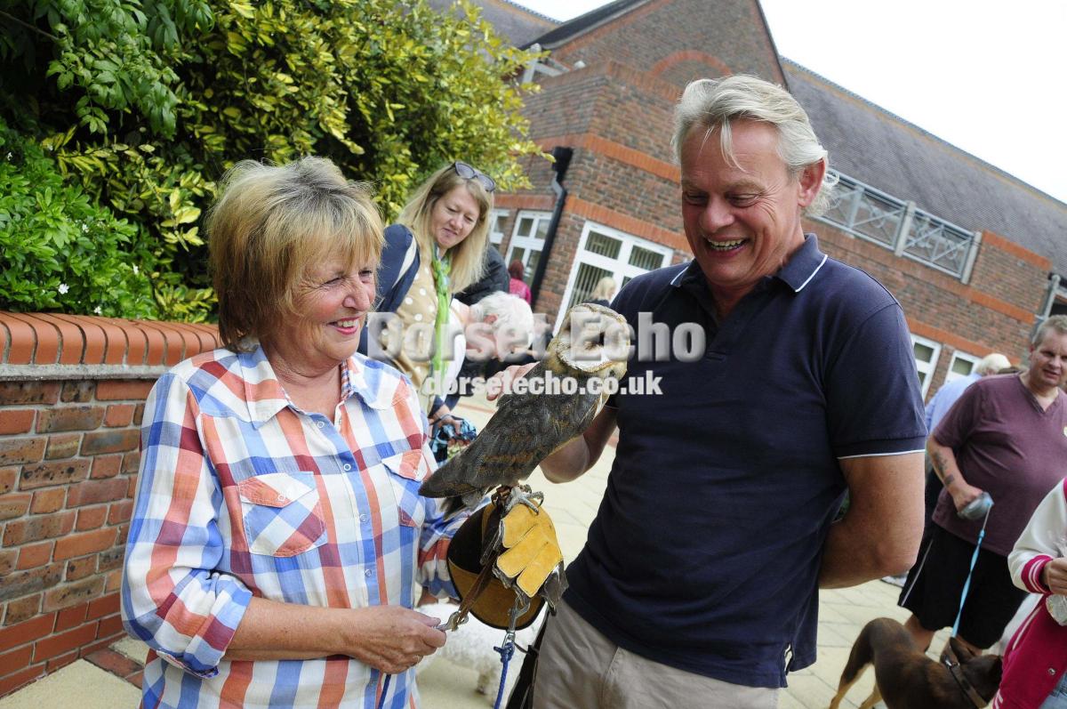 Martin Clunes leads the celebrations at the annual Weldmar Fete