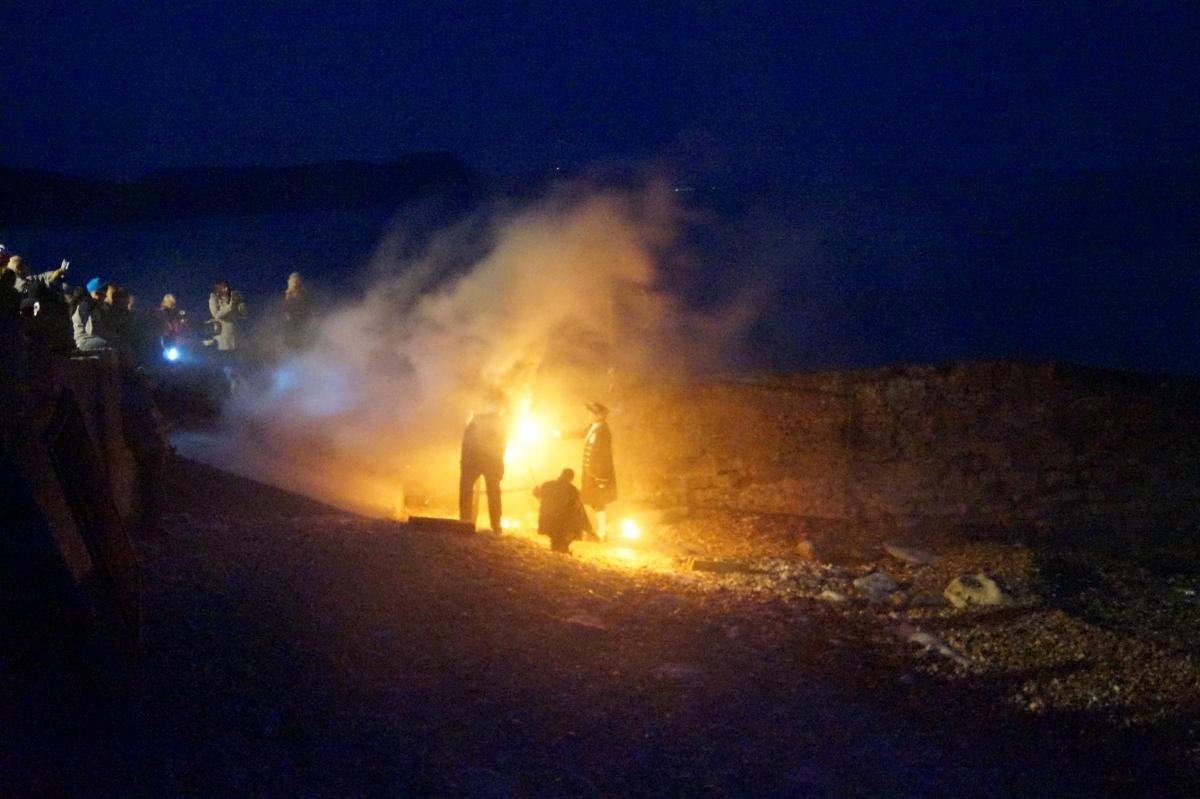The beacon is lit at Back Beach, Lyme Regis. Picture by Gail Pitter