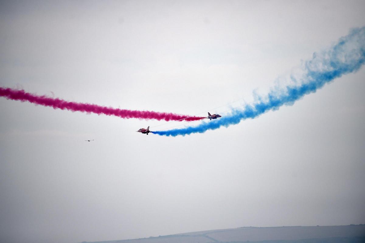 CLOSE CALL: Red Arrows swoop past each other