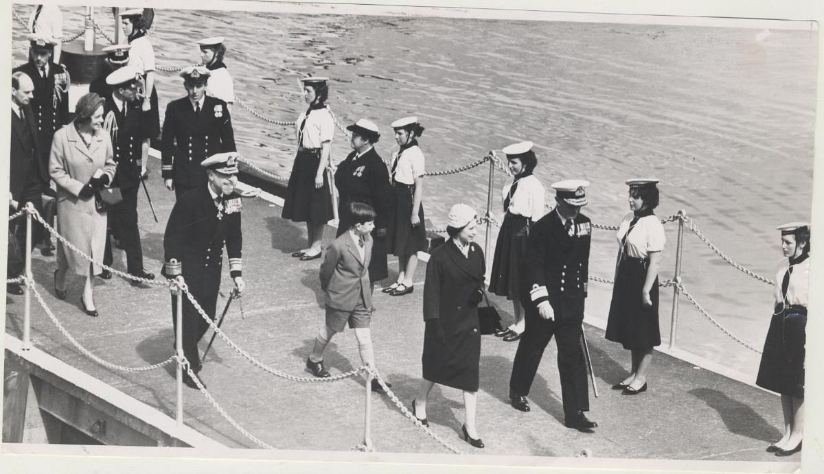 The Queen, the Duke and a 10-year-old Prince Charles visit HMS Eagle in 1959