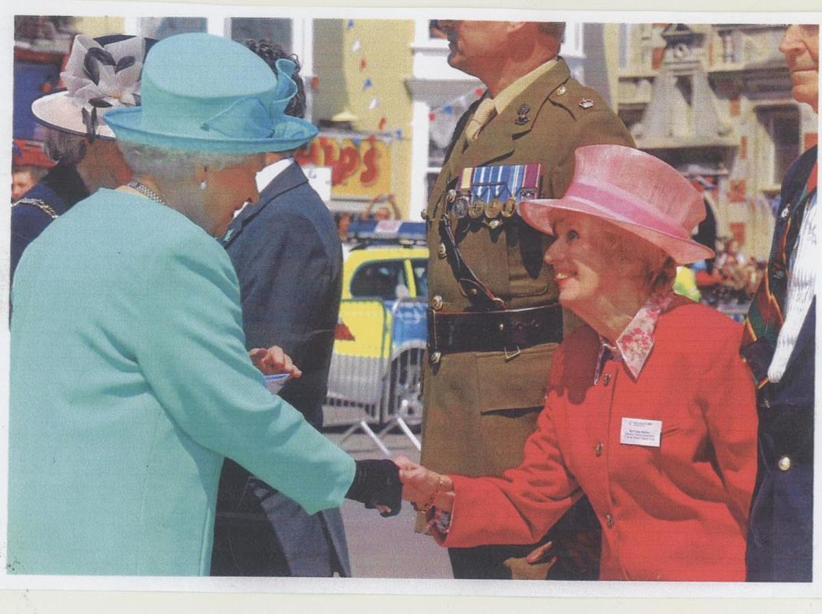 The Queen meets Poppy Butcher in 2009