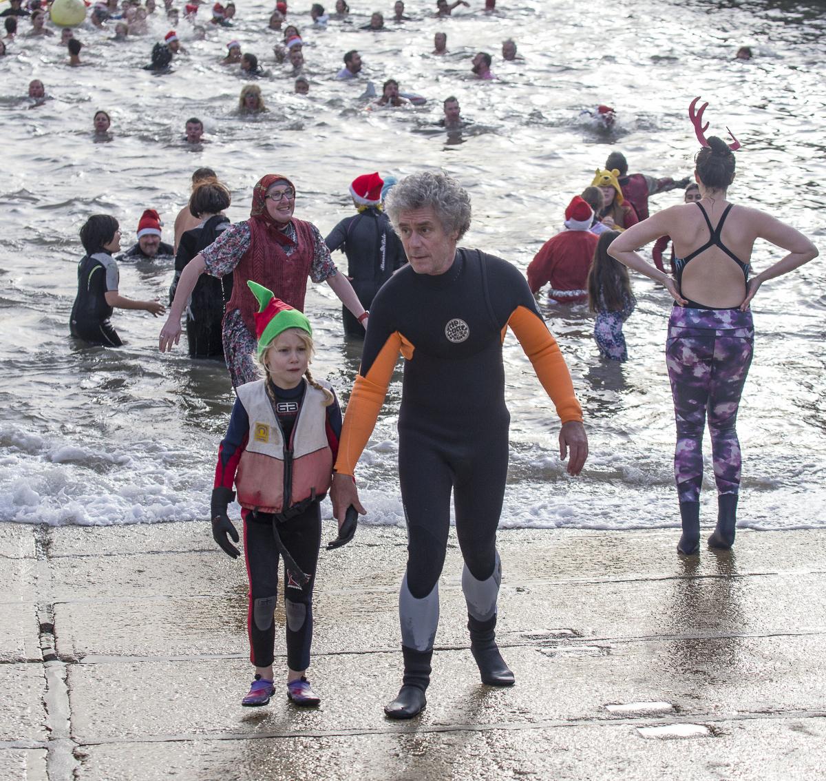 Huge crowds turned out to cheer on swimmers at West Bay Wallow 2016.