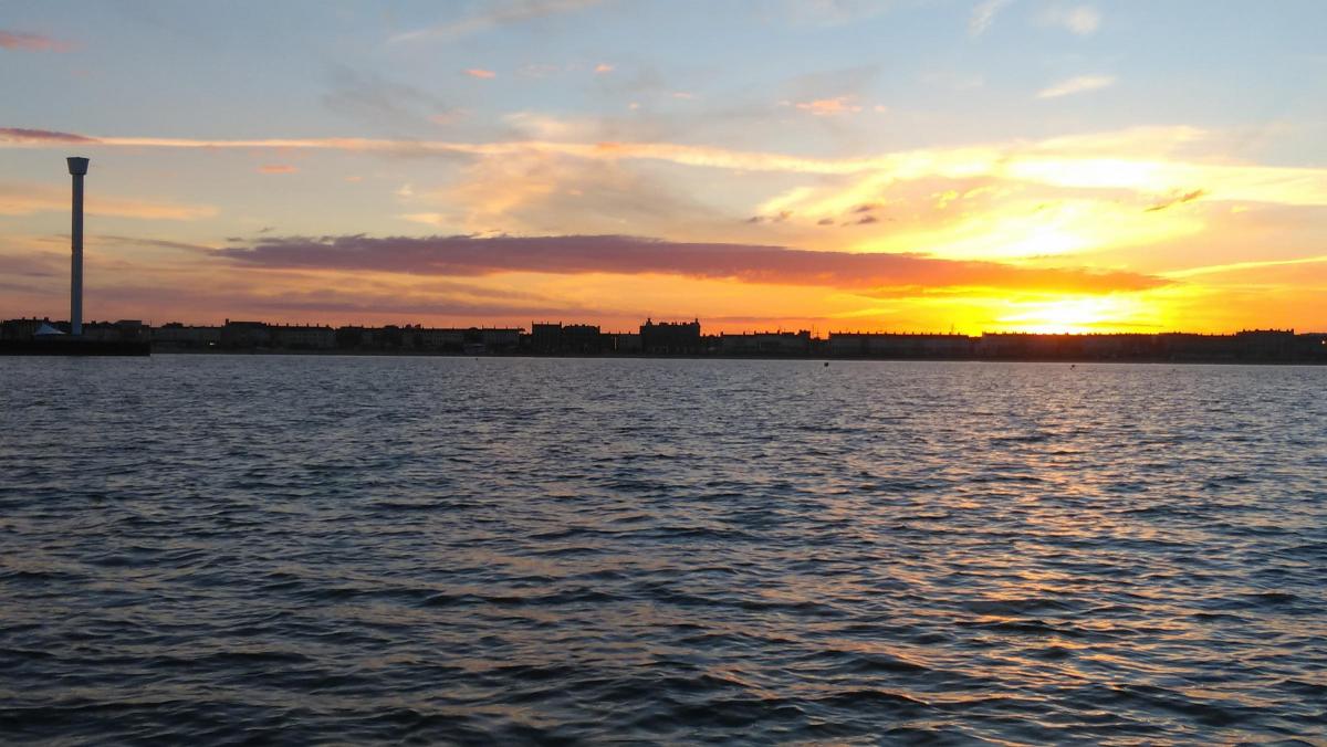 Sunset of Weymouth bay whilst out fishing July 2016 by Stuart Morgan