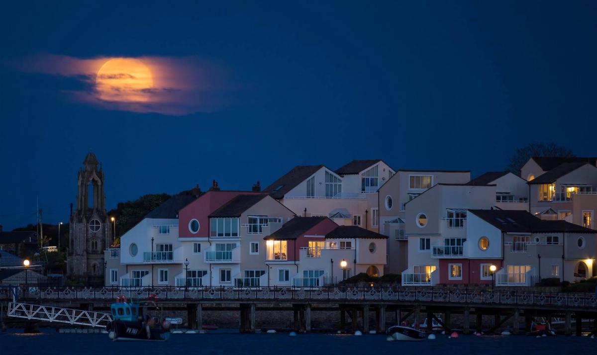 Moon rising over the Haven Apartments, Peveril Point, Swanage May 2016 by Gareth James