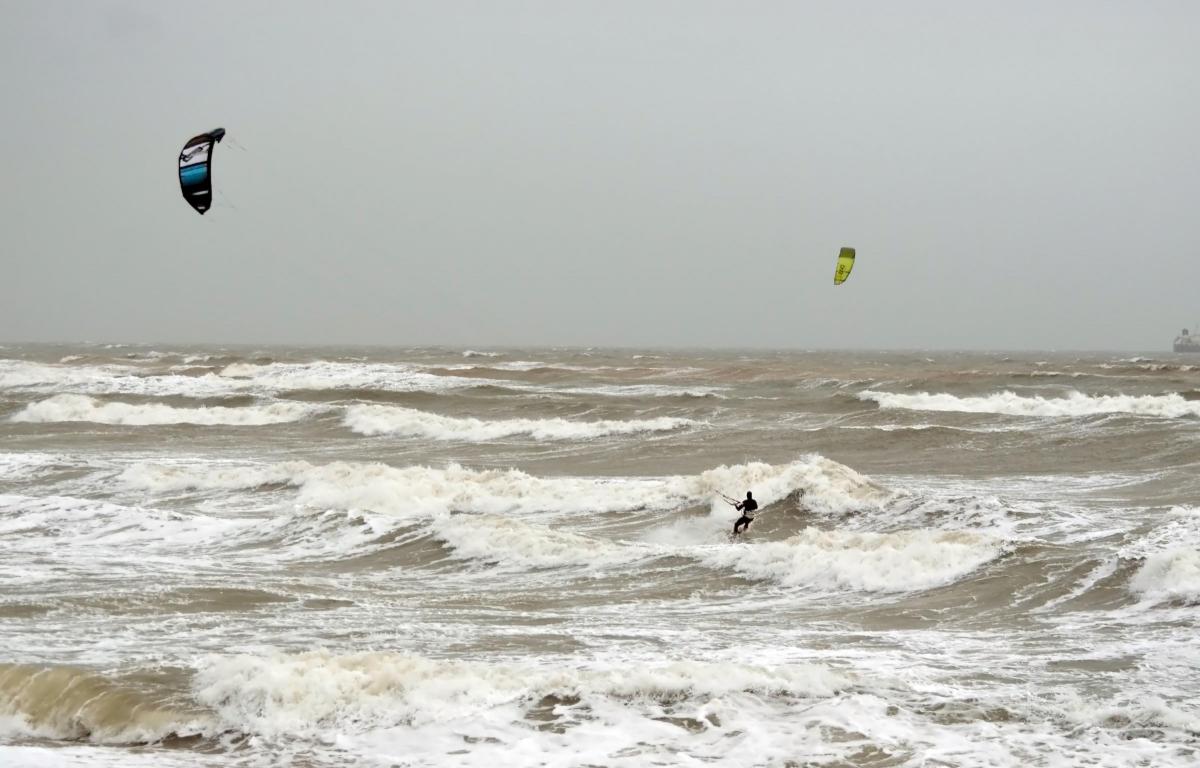 Para-surfers at Overcombe during Storm Frank, January 2016 by Grahame Howard