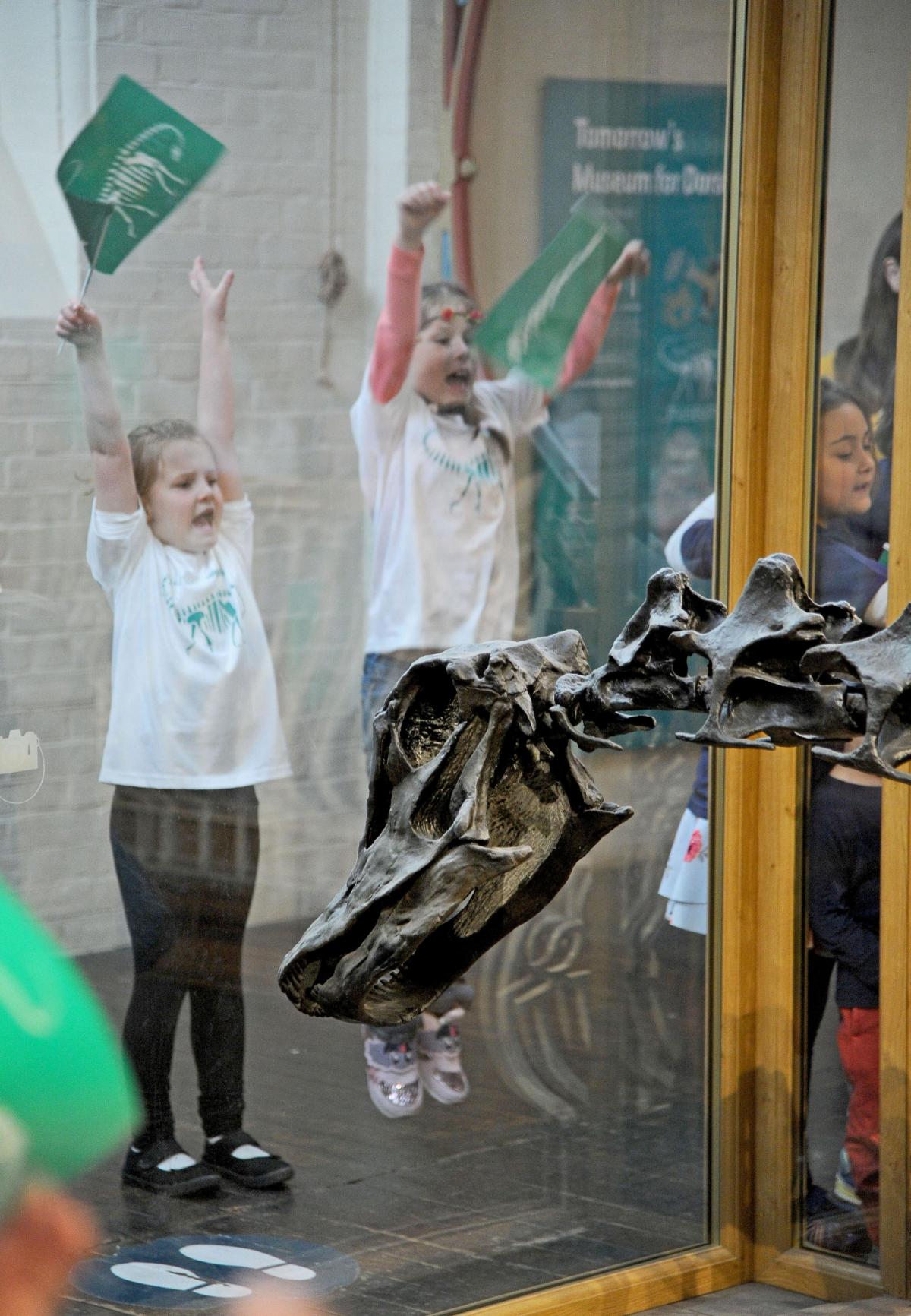 FAREWELL: Children say goodbye to their favourite dinosaur