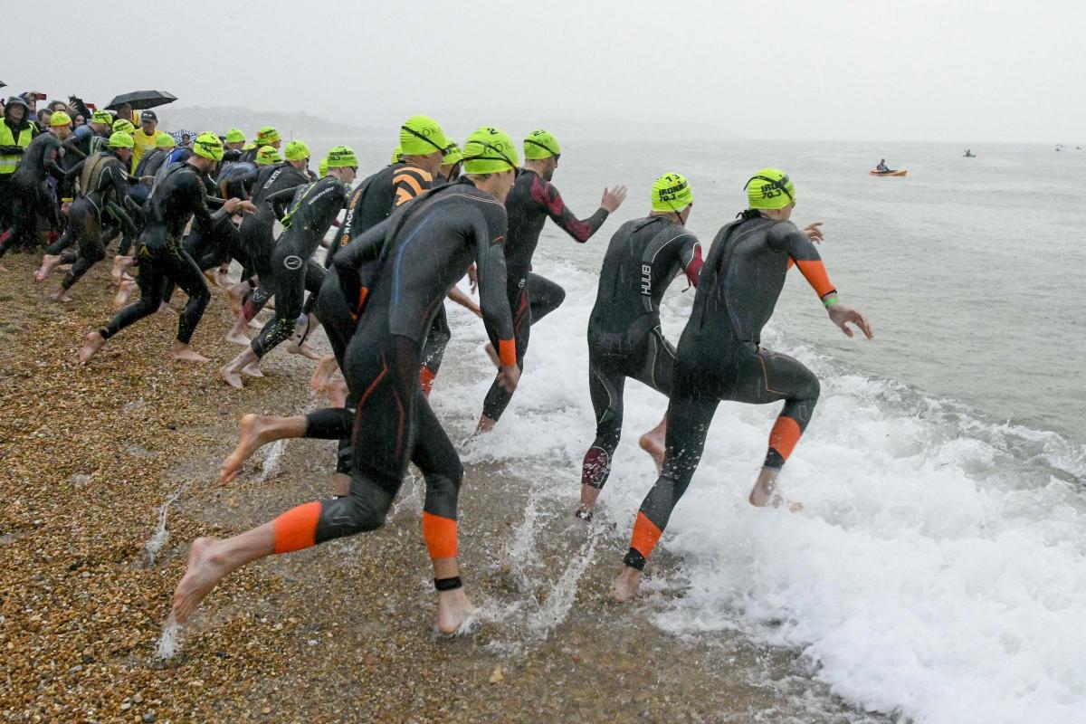 Pictures Thousands of athletes take part in gruelling Ironman ...