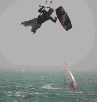 Robin Snuggs, 15, is riding his board 'White Air', an extreme sports festival on the island, which is also the final of the Kite Boarding British Tour.