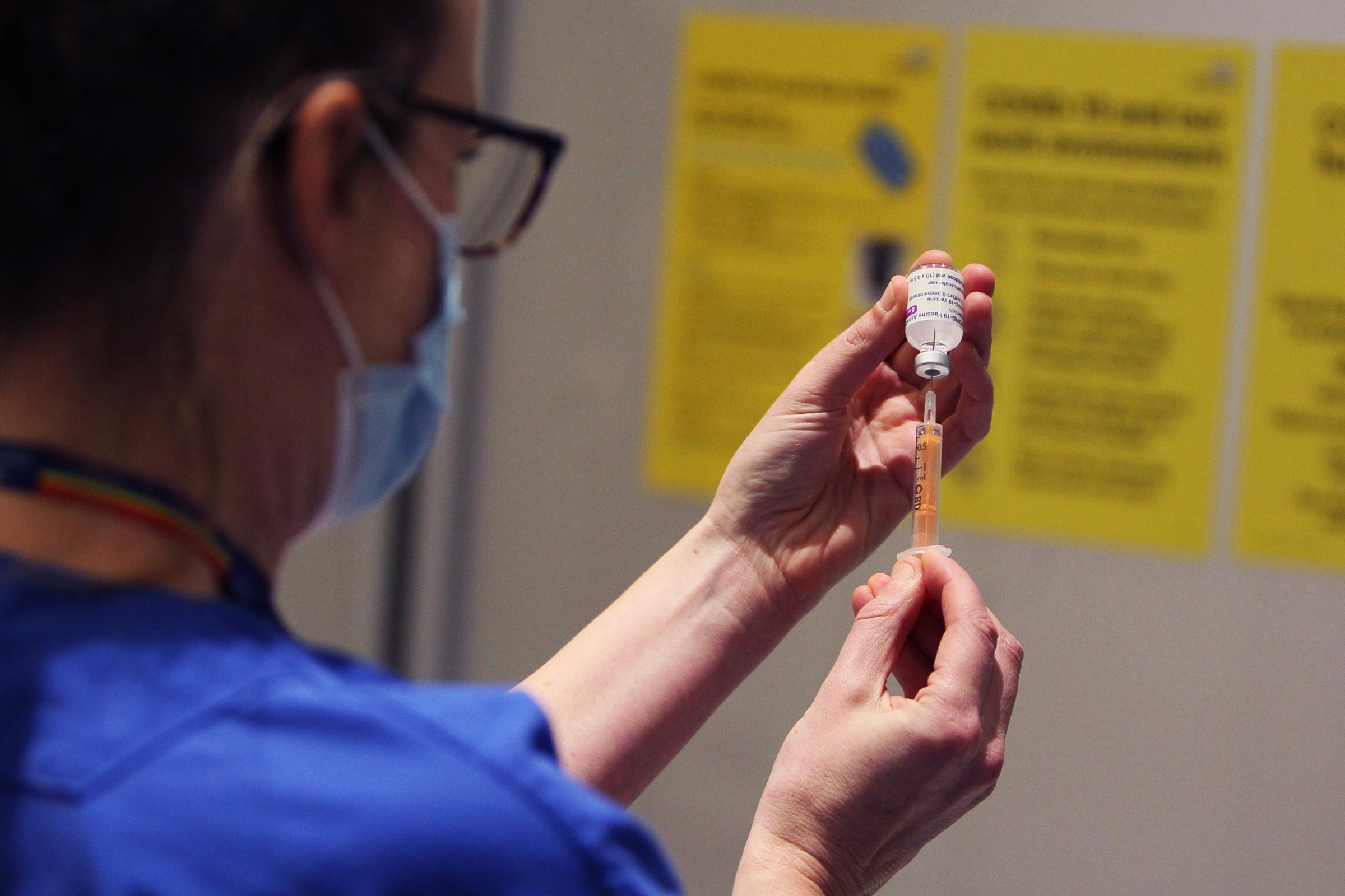 Nurse prepares to administer AstraZeneca vaccine. Picture Ed Nix