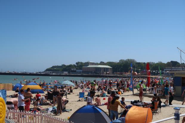 Dorset Echo: Photos show a busy Weymouth beach and town centre as tourists and residents enjoy a warm and sunny Bank Holiday Monday. Picture: Dorset Echo/Michael Taylor