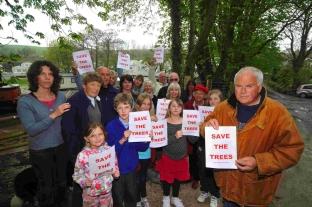 Kevan Sheehan, right, with fellow Osmington residents are angry over the new developments