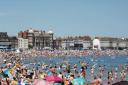 Visitors soak up the sun on Weymouth Beach in 2021 Picture: Graham Hunt Photography