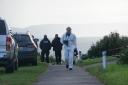 Police in the area of Boscombe Overcliff Drive following the discovery of Mr Shotton’s remains