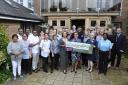 Colten Care colleagues celebrate the Outstanding rating for Sherborne care home Abbey View