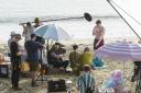 A scene being filmed at Lyme Regis beach today