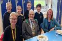Mayor of Dorchester Alistair Chisholm sitting down to enjoy a school meal with Year 5  pupils