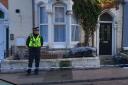 A police cordon has been set up around the house on Lennox Street with an officer standing guard