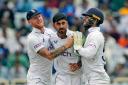 Shoaib Bashir (centre) celebrated a maiden Test five-wicket haul on Sunday (Ajit Solanki/AP)