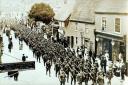 Soldiers marching through Poole High Street in the First World War