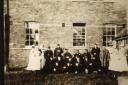 Nurses and patients outside the old Christchurch Infirmary in the First World War