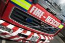 Fire crews rescue youths from roof