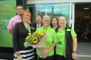 GOODBYE: Sandy West, middle, and staff from the Asda on Newstead Road, Weymouth