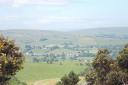 Looking down on Kirkby Stephen from the climb up to Nine Standards Rigg