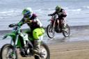 Weymouth beach motocross, Dorset, Up to 300 riders and estimated 20,000 people, families and bikers watch the annual races, hosted by the Weymouth and Portland Lions Club and the Purbeck Motocross Club to raise money for charity Picture by: Finnbarr Webs