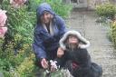 Hazel and grandaughter Freya brave the raain in The Gatehouse garden