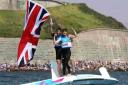 FLYING THE FLAG: Luke Patience and Stuart Bithell celebrate winning their silver medal in front of crowds beneath the Nothe