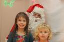 Neve and Matilda meet up with Father Christmas at Cattistock Christmas Bazaar