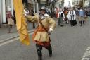 Members of the Taunton Garrison marching through the streets of Lyme Regis as they re-enact the siege of 1664