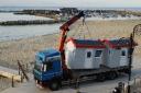 The lookout hut arrives at Lyme Regis ahead of the lifeguard service launch on Saturday