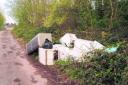 The collection of fridges dumped in Cuckoo Lane at Higher Bockhampton and, right, Stinsford councillor Andrew Thomson who reported the fly-tipping