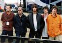 Oasis at the Knebworth concert in 1996 (PA Features Archive/Press Association Images)