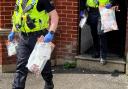 Dorset Police carrying out a drug raid from a previous operation