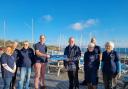 Paul Knight (centre left) with members of Castle Cove Sailing Club