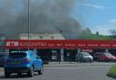Firefighters have responded to a building fire in Bridport. The fire is behind East Street (not the autocentre)