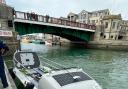 The rowing boat was towed to a waiting pontoon in Weymouth