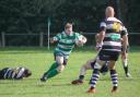 Jamie Morgan, centre, scored his 50th try for Dorchester in the defeat