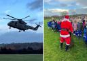 Royal Navy Merlin MK 4 by the 846 Royal Navy squadron  flying over St Mary's CE Middle School and Santa giving out sweets to pupils