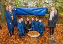 From left: Bellway Wessex Sales Advisor Katie Hewson; pupils from Blandford St Mary Primary School with Forest School Leader and Year 1 Teacher Lauren Pidgeon; and Bellway Wessex Sales Manager Emily Putnam with some of the new forestry equipment