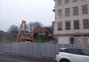 Excavators are making progress with tearing the building down