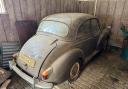 Morris Minor in a stable